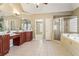 Spacious main bathroom with double vanity, large shower, and soaking tub at 2130 Hollowbrooke Nw Way, Acworth, GA 30101