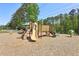 Community playground with slides, climbing structures, and soft landing surface for safe play at 2130 Hollowbrooke Nw Way, Acworth, GA 30101