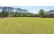 The community recreational field offers plentiful room for play and activities at 2130 Hollowbrooke Nw Way, Acworth, GA 30101