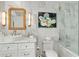 Stylish bathroom featuring marble walls, a vessel sink, and a soaking tub with shower at 3300 Windy Ridge Se Pkwy # 1501, Atlanta, GA 30339