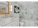 Elegant bathroom featuring marble walls, a vessel sink, and a soaking tub with shower at 3300 Windy Ridge Se Pkwy # 1501, Atlanta, GA 30339