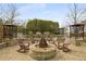 Picturesque outdoor fire pit area with comfortable seating, lush landscaping, and beautiful design at 3300 Windy Ridge Se Pkwy # 1501, Atlanta, GA 30339
