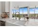 Bright kitchen featuring farmhouse sink and floor-to-ceiling windows overlooking natural landscape at 3300 Windy Ridge Se Pkwy # 1501, Atlanta, GA 30339