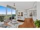 Bright living room with floor-to-ceiling windows and a balcony overlooking scenic views at 3300 Windy Ridge Se Pkwy # 1501, Atlanta, GA 30339