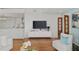 Stylish living room featuring a modern entertainment center and comfortable sitting area at 3300 Windy Ridge Se Pkwy # 1501, Atlanta, GA 30339