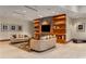 Inviting lobby featuring neutral tones, comfortable seating, a decorative media center, and tiled floors at 3300 Windy Ridge Se Pkwy # 1501, Atlanta, GA 30339