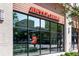 Bright storefront of Jeni's Ice Creams with large glass windows and view of the surrounding street at 3300 Windy Ridge Se Pkwy # 1501, Atlanta, GA 30339