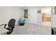 Finished basement offers flexible space, a chair, and a convenient entrance to the main house at 4812 Lismoor Sw Trce, Mableton, GA 30126