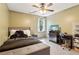This bedroom is furnished with a bed, desk and television at 4812 Lismoor Sw Trce, Mableton, GA 30126
