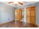 This bedroom features hardwood floors and ample closet space and an adjacent doorway at 4812 Lismoor Sw Trce, Mableton, GA 30126