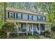 Charming two-story home with inviting front porch and mature landscaping at 4812 Lismoor Sw Trce, Mableton, GA 30126