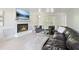 Comfortable living room with cozy fireplace and plush leather sectional sofa at 4812 Lismoor Sw Trce, Mableton, GA 30126