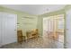 Eat-in kitchen features access to the dining area and outdoor views at 8849 Seneca Rd, Palmetto, GA 30268