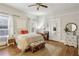 Bright bedroom featuring hardwood floors, and neutral wall color, offering a serene retreat at 940 Austin Ave, Atlanta, GA 30307