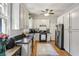 Functional kitchen featuring stainless steel appliances, white cabinets, and ample counter space for cooking at 940 Austin Ave, Atlanta, GA 30307