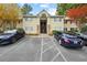 Inviting two-story condo with stone accents, well-maintained landscaping, and dedicated parking at 1468 Briarwood Ne Rd # 810, Brookhaven, GA 30319