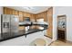 Spacious kitchen with granite countertops, stainless steel appliances, and wooden cabinets at 1468 Briarwood Ne Rd # 810, Brookhaven, GA 30319