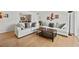 Spacious living room with hardwood floors and open floor plan, furniture, and nice decor at 1468 Briarwood Ne Rd # 810, Brookhaven, GA 30319