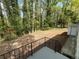 An expansive backyard features a treelined perimeter and privacy. The large backyard has wood mulch installed at 3467 Valley Ridge Sw Ter, Atlanta, GA 30331