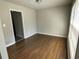 Dining room with hardwood floors, neutral paint colors, and large windows with natural light at 3467 Valley Ridge Sw Ter, Atlanta, GA 30331