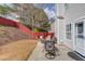 Inviting backyard patio with outdoor seating, perfect for relaxing or entertaining guests with a privacy fence at 3904 Tristan Way, Suwanee, GA 30024