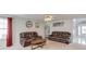 Comfortable living room with plush seating, neutral carpet, and ample natural light, creating a relaxing space at 3904 Tristan Way, Suwanee, GA 30024