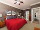 Comfortable bedroom with a plush bed, neutral walls, ceiling fan, and natural light at 62 Emerson Hill Sq, Marietta, GA 30060