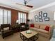 Relaxing living room with exposed brick, neutral colored sofa, and stylish decor at 62 Emerson Hill Sq, Marietta, GA 30060