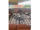 Outdoor patio with a seating area and patterned rugs, offering views of the city and mountains at 62 Emerson Hill Sq, Marietta, GA 30060