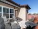 Relaxing outdoor patio with comfortable seating, a dining table and ample sunlight at 62 Emerson Hill Sq, Marietta, GA 30060