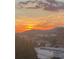 Beautiful mountain sunset view of the city and surrounding landscape with a vibrant sky at 62 Emerson Hill Sq, Marietta, GA 30060