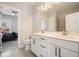 This bathroom features double sinks, modern fixtures and a doorway leading into the bedroom at 163 Neese Farm Dr, Woodstock, GA 30188