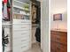 Open closet featuring shelving, drawers and hanging space for clothing and accessories at 163 Neese Farm Dr, Woodstock, GA 30188