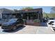 Inviting restaurant exterior featuring outdoor seating, adorned with plants, and the 'Salt' sign prominently displayed at 163 Neese Farm Dr, Woodstock, GA 30188