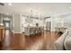 Open concept kitchen boasts an island with bar stool seating and stainless steel appliances at 163 Neese Farm Dr, Woodstock, GA 30188