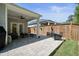 Back patio features outdoor seating and a freshly mowed lawn at 163 Neese Farm Dr, Woodstock, GA 30188