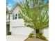 Beautiful townhome with large garage and well-maintained landscaping, inviting and appealing at 5522 Donerail St, Lithonia, GA 30058