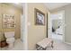 Bathroom with a toilet, shower, and an adjacent bedroom at 6840 N Creekside Pt, Cumming, GA 30041
