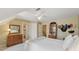 Comfortable bedroom featuring neutral walls, ceiling fan, and vintage furniture at 6840 N Creekside Pt, Cumming, GA 30041