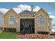 Rear exterior view of the home showing screened-in porch, multi-level decks and architectural windows at 6840 N Creekside Pt, Cumming, GA 30041