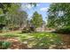 Expansive backyard with lush green grass and privacy fence, perfect for outdoor enjoyment at 1811 Tilliewood Ne Trl, Marietta, GA 30066
