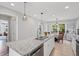 Bright eat-in kitchen with an island, stainless steel appliances, and tile floors at 1811 Tilliewood Ne Trl, Marietta, GA 30066