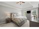 Relaxing main bedroom features plush carpet, neutral paint, and lots of natural light at 1811 Tilliewood Ne Trl, Marietta, GA 30066
