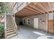 Spacious covered patio with concrete floor, perfect for outdoor storage and activities at 1811 Tilliewood Ne Trl, Marietta, GA 30066