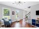 Cozy sitting room featuring hardwood floors, neutral paint, and lots of natural light at 1811 Tilliewood Ne Trl, Marietta, GA 30066