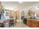 Cozy kitchen area with a breakfast table, open layout, and access to adjacent rooms at 5780 Village Loop, Fairburn, GA 30213