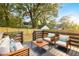 Relaxing back deck with furniture and fence at 358 Roy Sw St, Atlanta, GA 30310