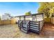 A fenced backyard features a small deck and a grassy area, perfect for outdoor enjoyment and privacy at 358 Roy Sw St, Atlanta, GA 30310