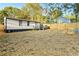 Large backyard with new wooden fence, providing privacy for entertaining or relaxing at 358 Roy Sw St, Atlanta, GA 30310
