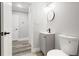 Bright bathroom with modern fixtures, a sink vanity, and a toilet at 358 Roy Sw St, Atlanta, GA 30310